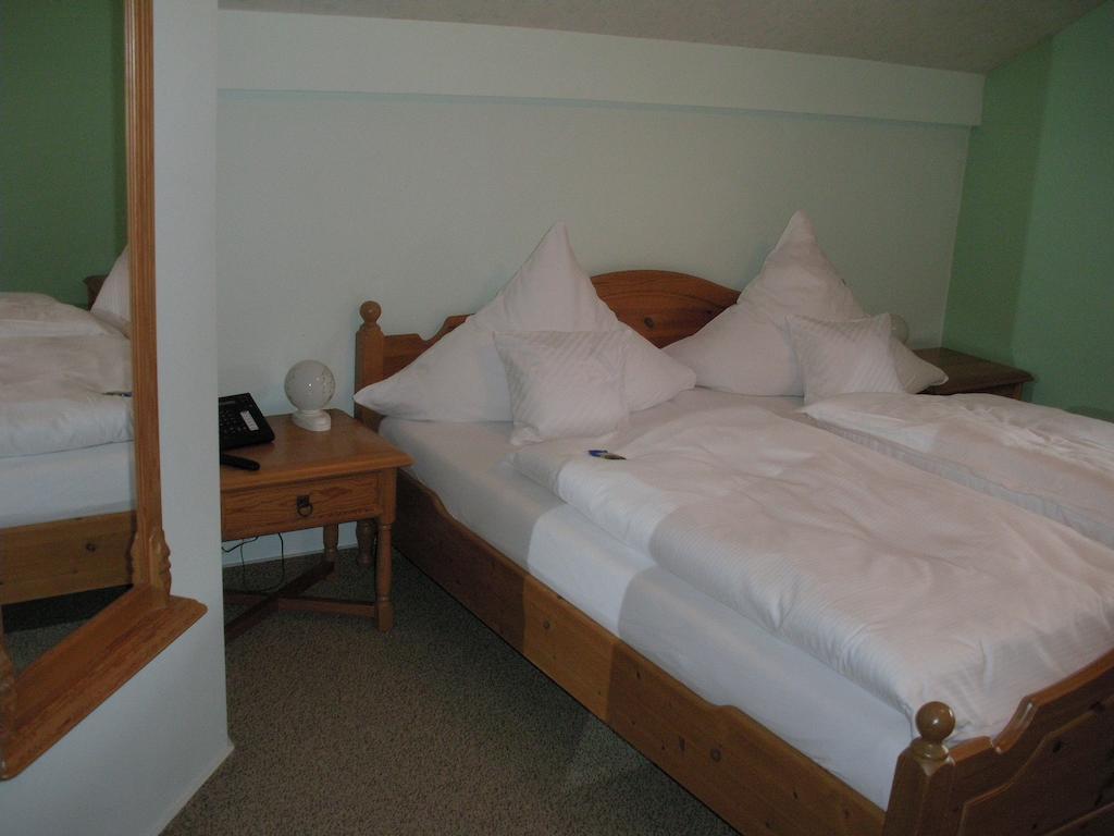 Hotel Company Cölbe Pokoj fotografie