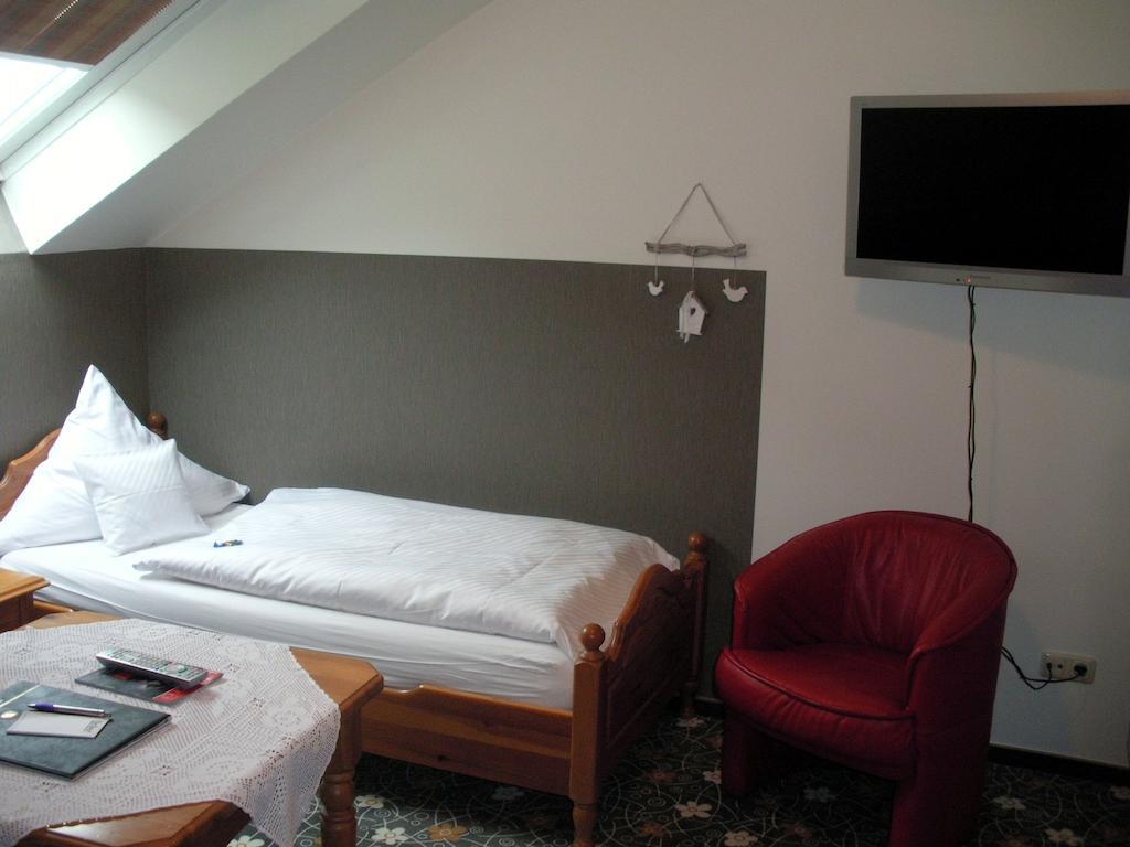 Hotel Company Cölbe Pokoj fotografie