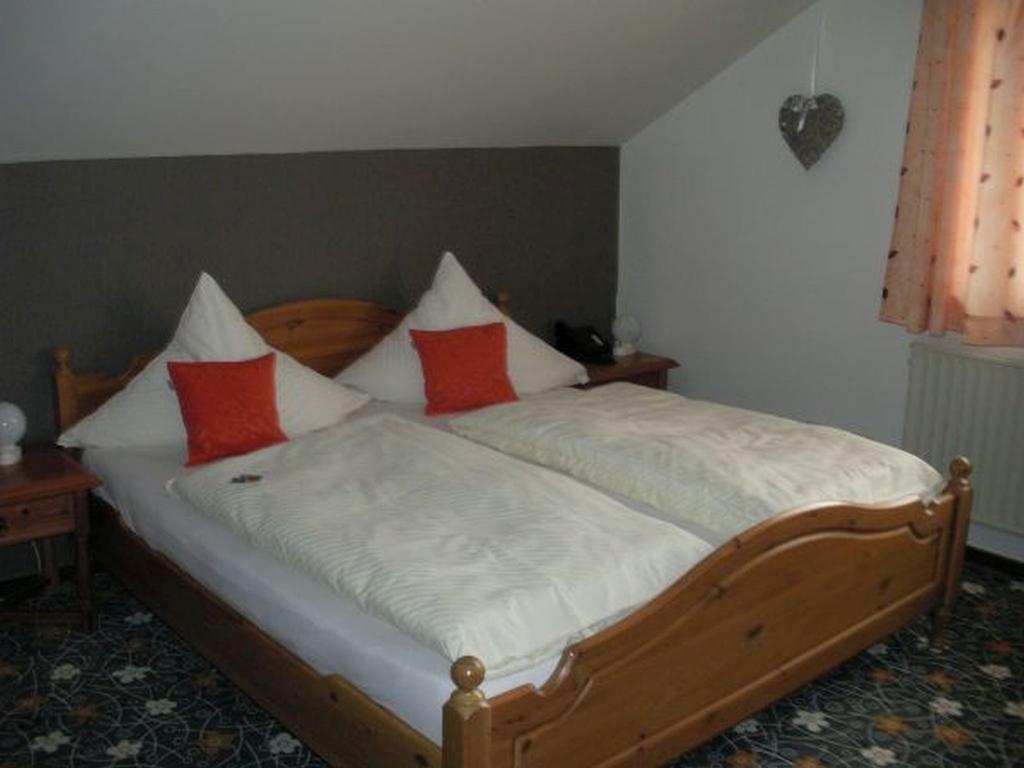 Hotel Company Cölbe Pokoj fotografie